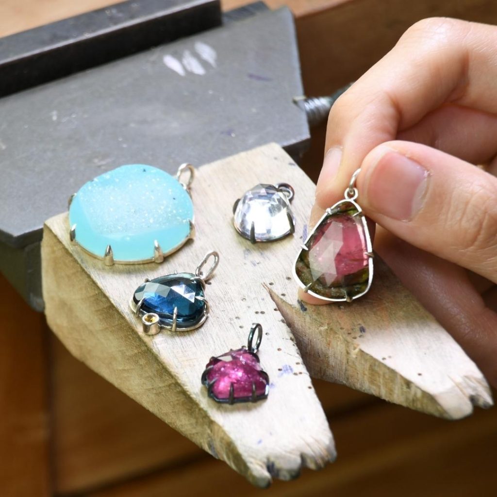 Prong set gemstone pendants
