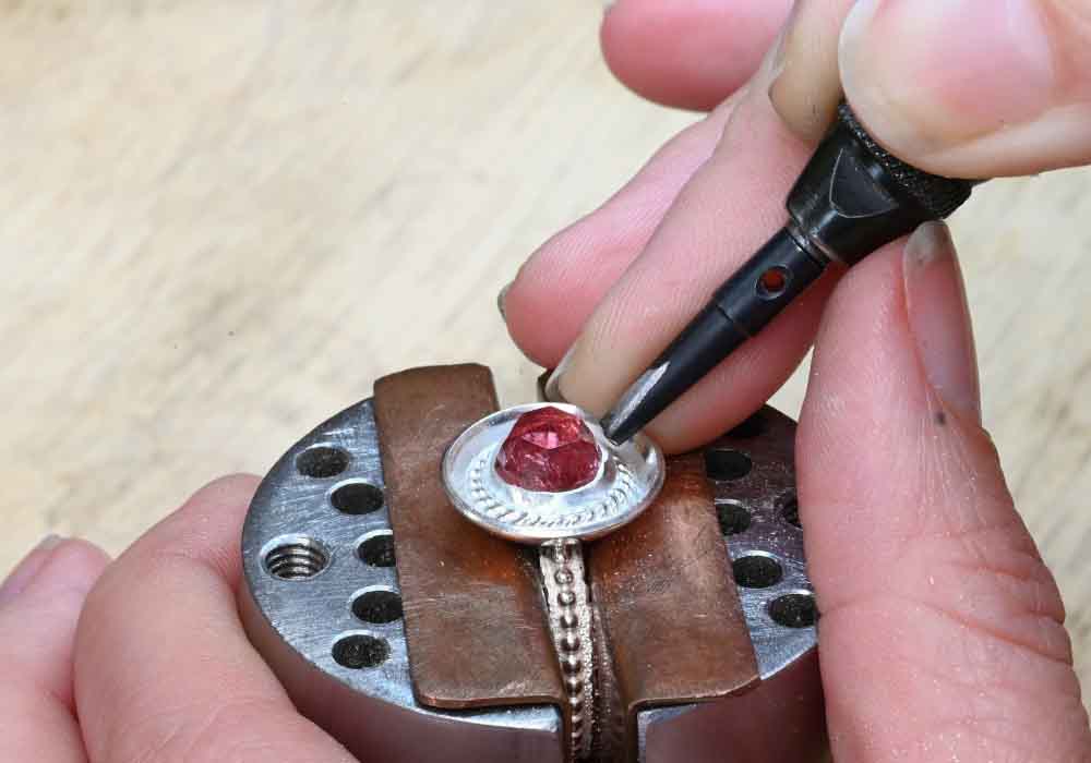 bezel setting a rose cut stone with a foredom hammer handpiece