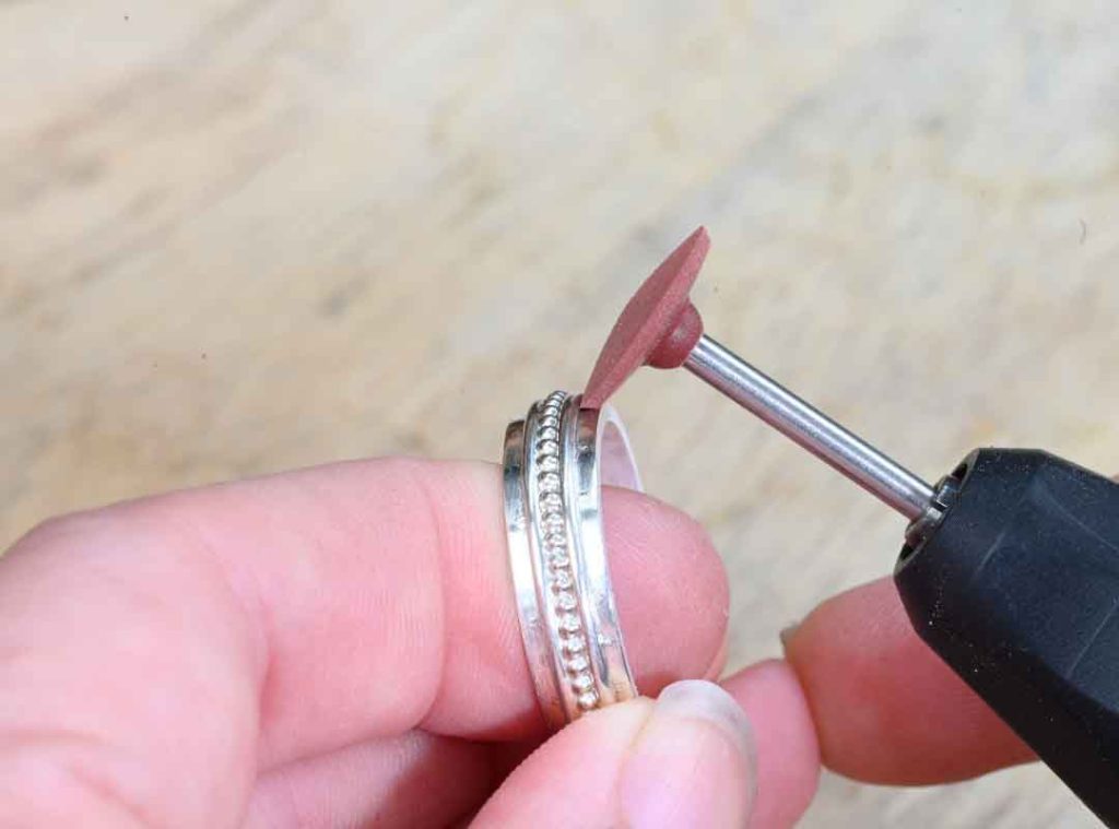 Using a rubber wheel for making a silver ring
