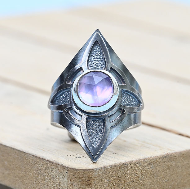 Hand made saddle ring with amethyst rose cut